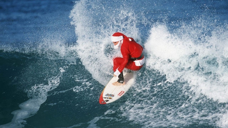surf on christmas santa surfing